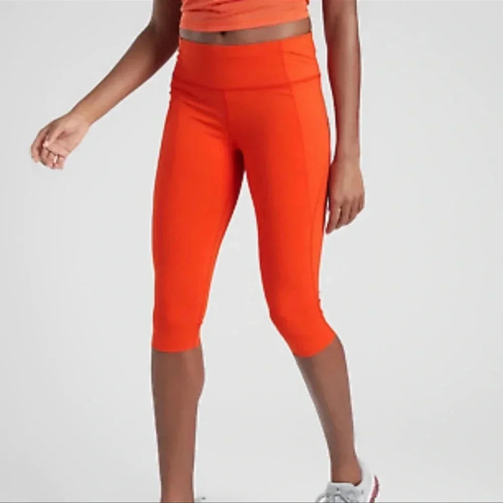 Athleta Velocity Crop Stash Pocket Leggings Orange size s